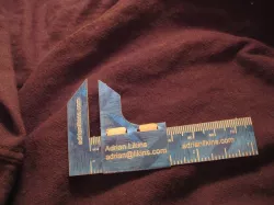 Business card caliper