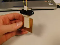 Sharp distance sensor clip