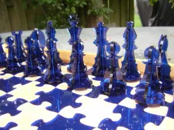 Chess set derivative with jigsaw chessboard