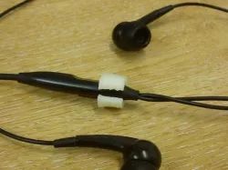 Headset mute button clip