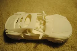 3D printable car with movable doors hoods steering wheel and ... Free 3D print model