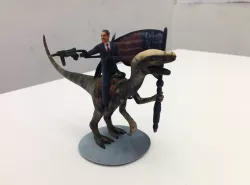 Obama with a Rocket Launcher and SMG Riding a Velociraptor 3D print model
