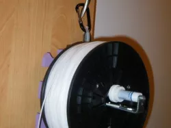 Filament spool holder from a used whiteboard marker