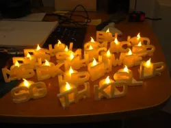 Printed 'place cards' with tealight holder