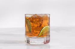 A glass of tea with lime slice nad ice cubes 3D model