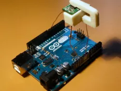 A chip holder for reseting the Da Vinci 1.0 filament chip using an Arduino