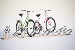 Bike stand with two colorful bikes 3D model
