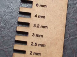 Sheet thickness gauge