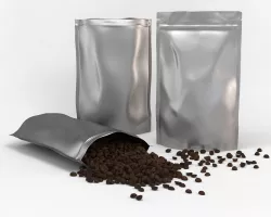 Coffee plastic pouch and scattered coffee beans 3D model