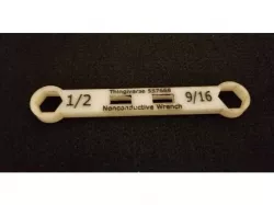 Nonconductive wrench with wingnut tightener slots