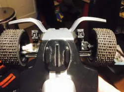 Left Axle Carrier and Upper Bracket for a Carrera RC Car (Dark Pirat)