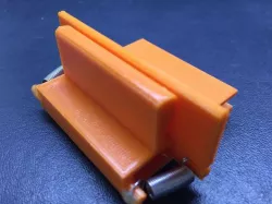 Spring loaded phone tripod attachment