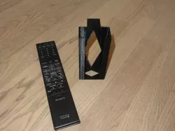 Remote holder for bed
