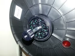 Spool holder for hex shaft fits most spools and uses gear bearing.