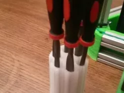 Revolver style pen holder