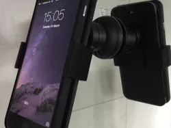 Cased iPhone 6 Plus car mount adapter.
