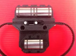 X carriage with belt tensioner