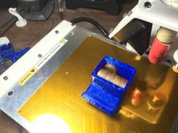 Pen rest with weight chamber.