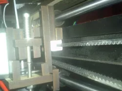 QU-BD One/Two up X-axis belt fixing part