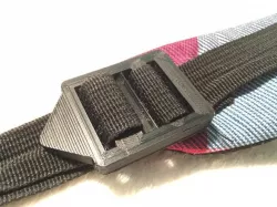 Backpack belt tensioner
