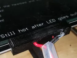 Heat bed front bracket cover thermister cover.