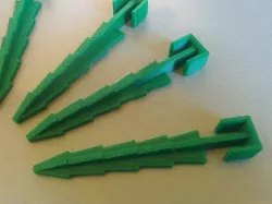 Robot mower wire peg