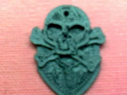 Skull and cross bones guitar pick