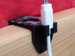 Phone cable holder