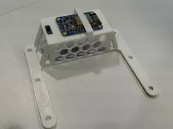 Adafruit Huzzah ESP8266 breakout board holder for Finbox