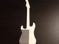 Combcaster : A comb based upon the famous guitar.