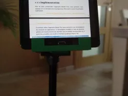Tablet holder for photographic tripod