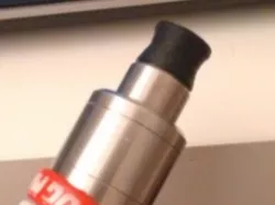 Wide bore curved drip tip