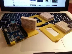 Arduino friction mounting plate with small breadboard addon