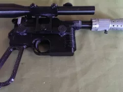 Mauser C96 model with flash hider and scope