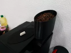 Coffee machine bean load extender