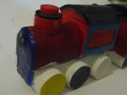 Train with space for electronics and batteries in carriage.