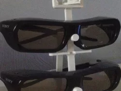 Stand for Sony TDG-PJ1 3D-glasses with rotating 3D-sign