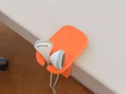 Earphone table holder