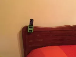 Hold TV remote control
