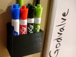 Wall mounted dry erase pen bin