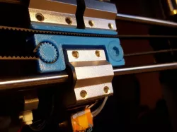 X- Axis Belt Mounting Bracket v2 (Cocoon Create, Wanhao Di3 v2, etc.)