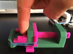 Mini rubber band vise