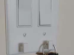 Decora double switch plate with key hooks