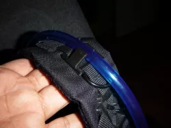 Molle attachment clip for Camelbak Hydration pack hose.