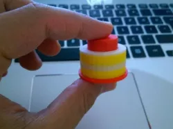 Push-down button with a ballpoint pen spring