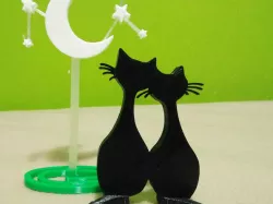 Cats looking at moon