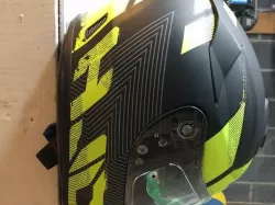 Wall mounted motorcycle helmet holder