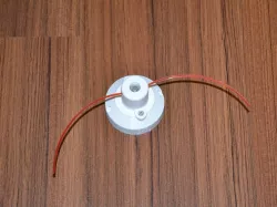 Head for nylon trimmer line