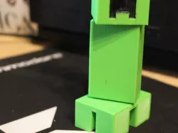 Movable Minecraft Creeper. Printed in one piece. Joints included in model.