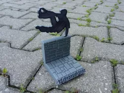 Parkour dude jumping over brick wall